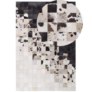Alfombra de piel blanca y negra rectangular 140 x 200 cm ar…