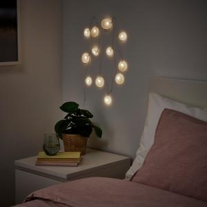 IKEA - guirnalda luminosa LED 12 luces, a pilasPiedras blan…