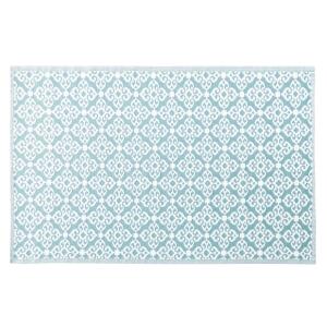 Alfombra de polipropileno azul con motivos gráficos blancos…