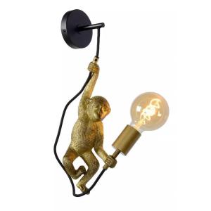 Aplique de pared de metal dorado con forma de mono