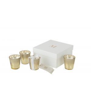 Caja de 4 velas perfumadas en vidrio champagne de 7x7x8 cm