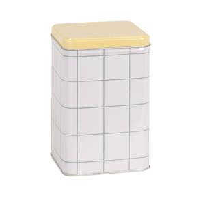 Caja de metal con cuadrados verdes y tapa amarilla