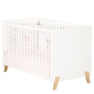 Cama de bebé de 120 x 60 sobre patas de madera blanca