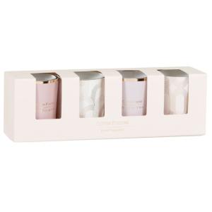 Estuche con velas perfumadas en tarros de vidrio rosa y dor…