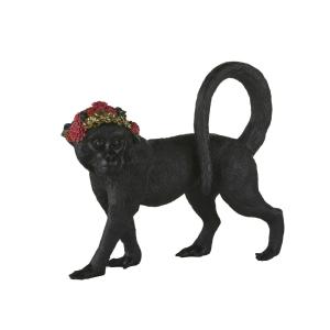 Figura de mono de resina en negro con corona de flores mult…