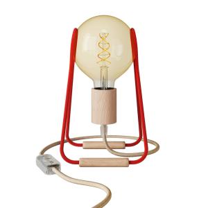 Lámpara de mesa de madera y metal con cable textil y detall…