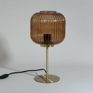 Lámpara dorada y pantalla de vidrio estriado marrón