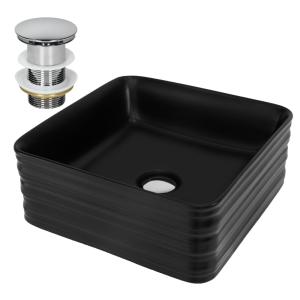 Lavabo negro cuadrado de cerámica con desagüe plateado