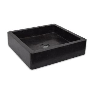 Lavabo sobre encimera de mármol negro