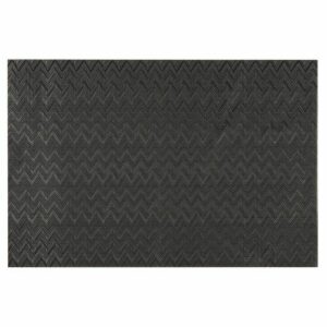 Mantel individual negro con motivos decorativos en zigzag