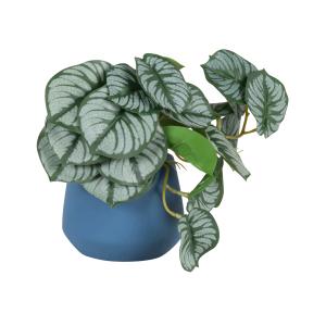 Planta artificial con macetero azul