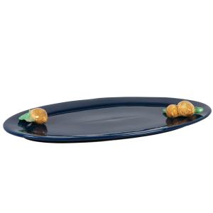 Plato de gres azul y limones amarillos en relieve