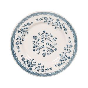 Plato de postre de cerámica blanca con flores azules