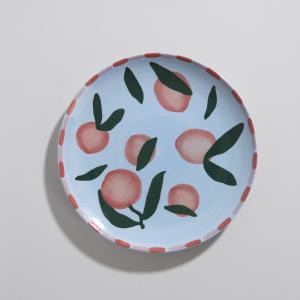 Plato llano de cerámica con naranja