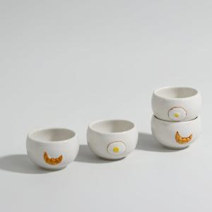 Set de 4 hueveras de gres blanco y marrón