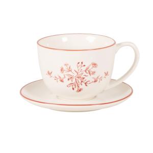 Taza y platillo de cerámica blanca con flores rojas