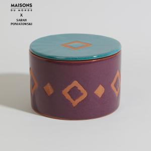 Vela de terracota naranja, violeta y azul con aroma a higo