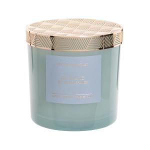 Vela perfumada en tarro de cristal tintado azul claro con m…